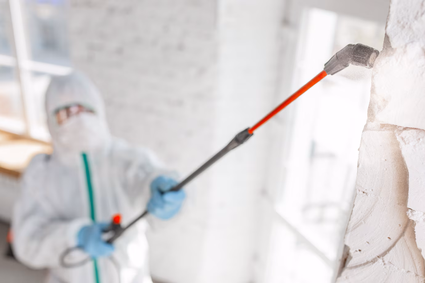 coronavirus-pandemic-disinfectant-protective-suit-mask-sprays-disinfectants-room_155003-4350